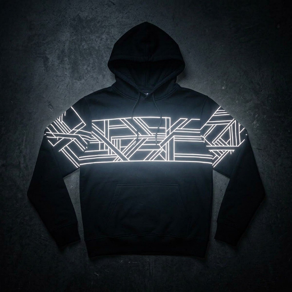 IX-01R Nightline Hoodie illuminated by headlight beam